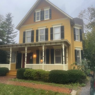 yellow house after